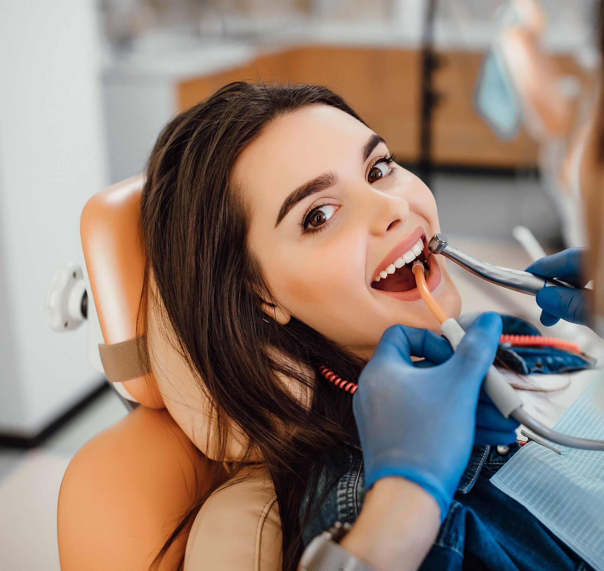 young-female-patient-visiting-dentist-office (2).jpg